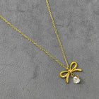 Bow and Zircon Heart Necklace