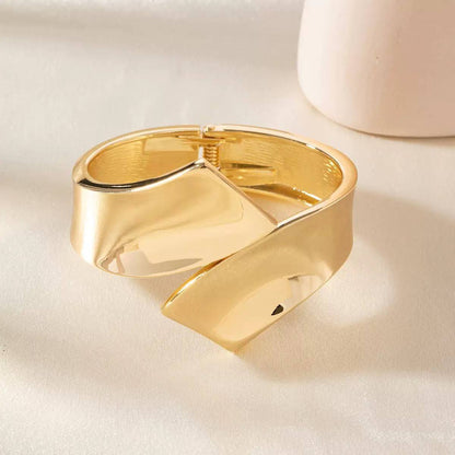 Cross Embracing Bangles