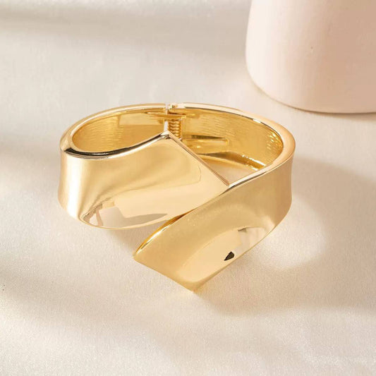 Cross Embracing Bangles